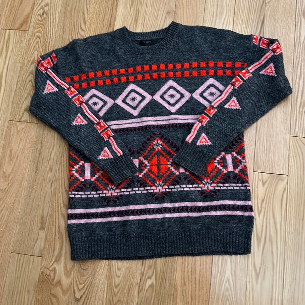 Fun and casual sweater. Warm, soft and very comfortable. Size small.